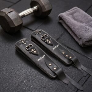 Black leather ankle straps with stainless steel buckle buttons and Cross-D ring